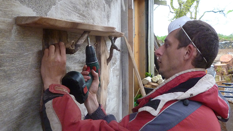 putting up a natural edge wood shelf